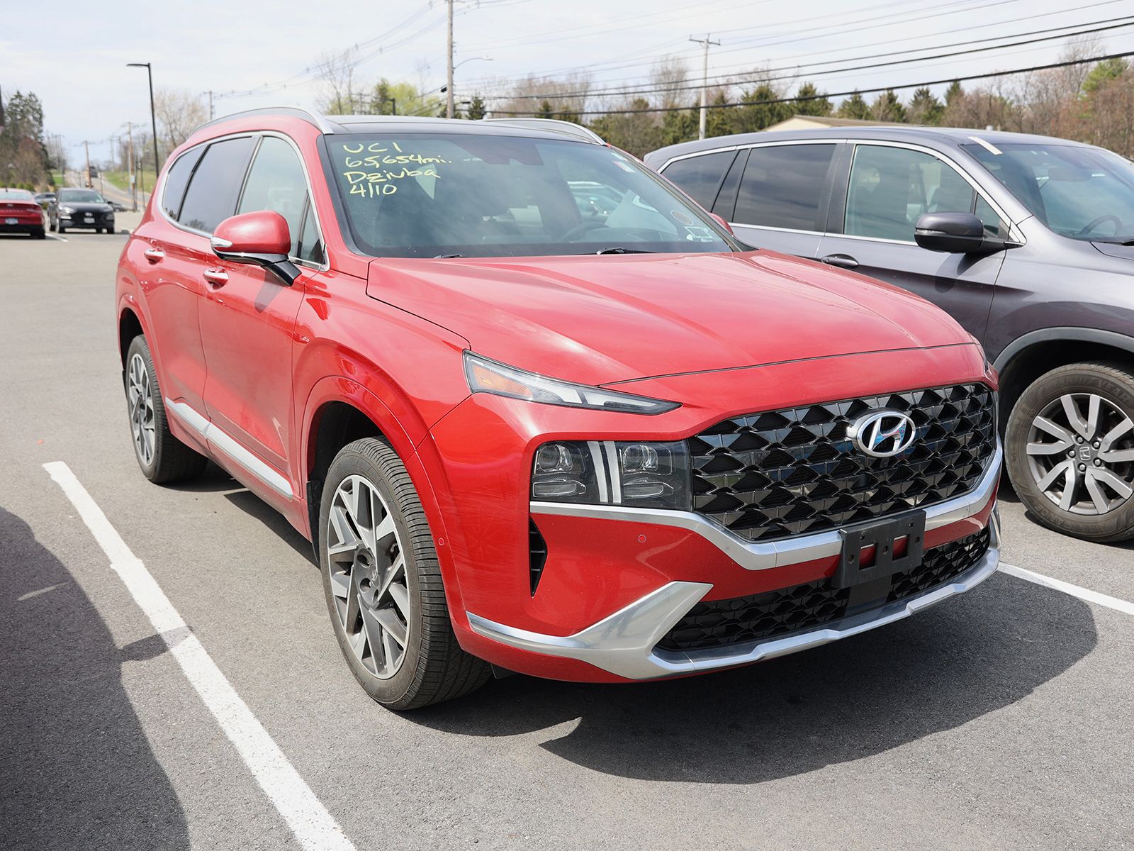 Photo view of 2022 Hyundai Santa Fe in Red