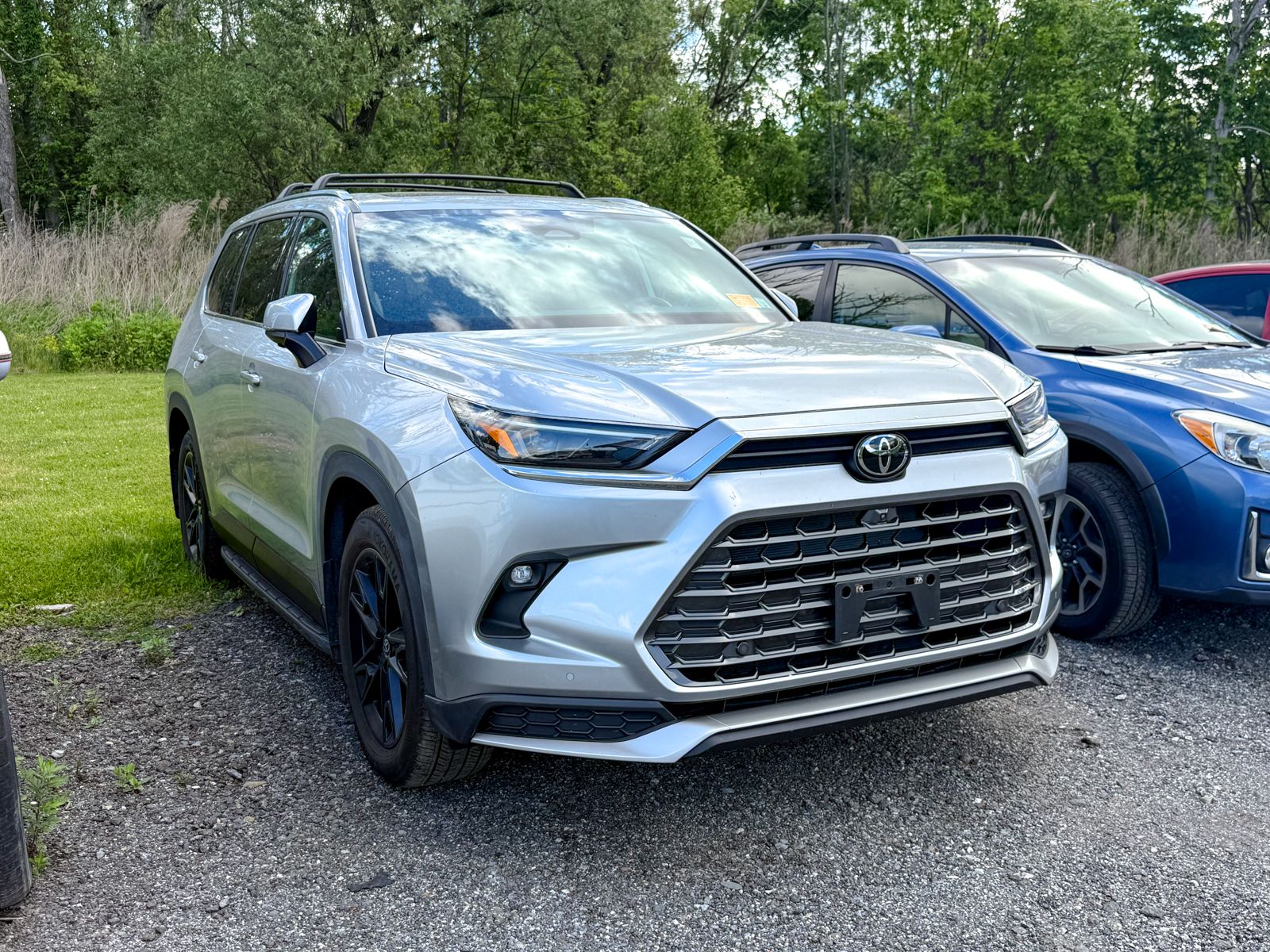 Photo view of 2024 Toyota Grand Highlander Hybrid in Silver