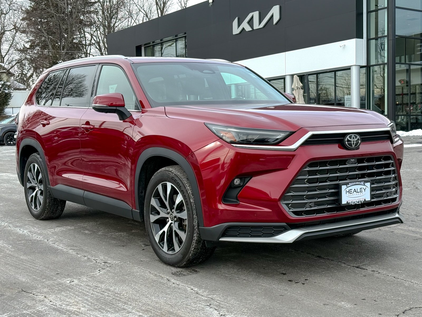 Photo view of 2024 Toyota Grand Highlander Hybrid in Red
