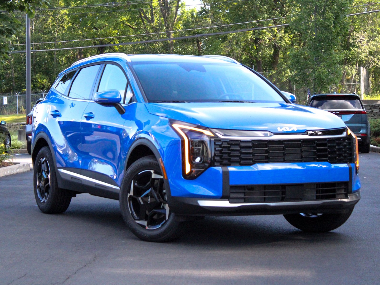 Photo view of 2026 Kia Sportage in Blue
