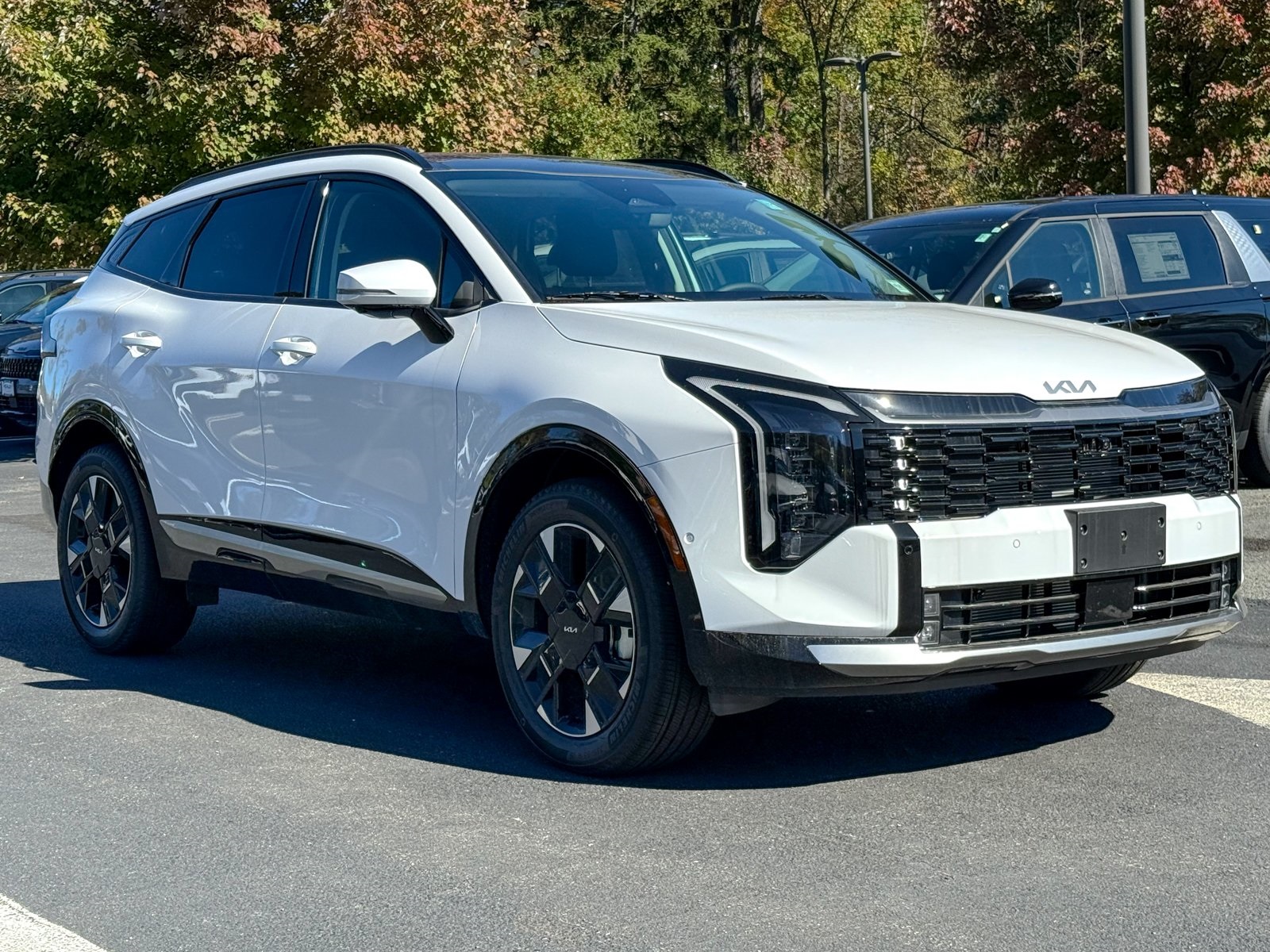 Photo view of 2026 Kia Sportage in White