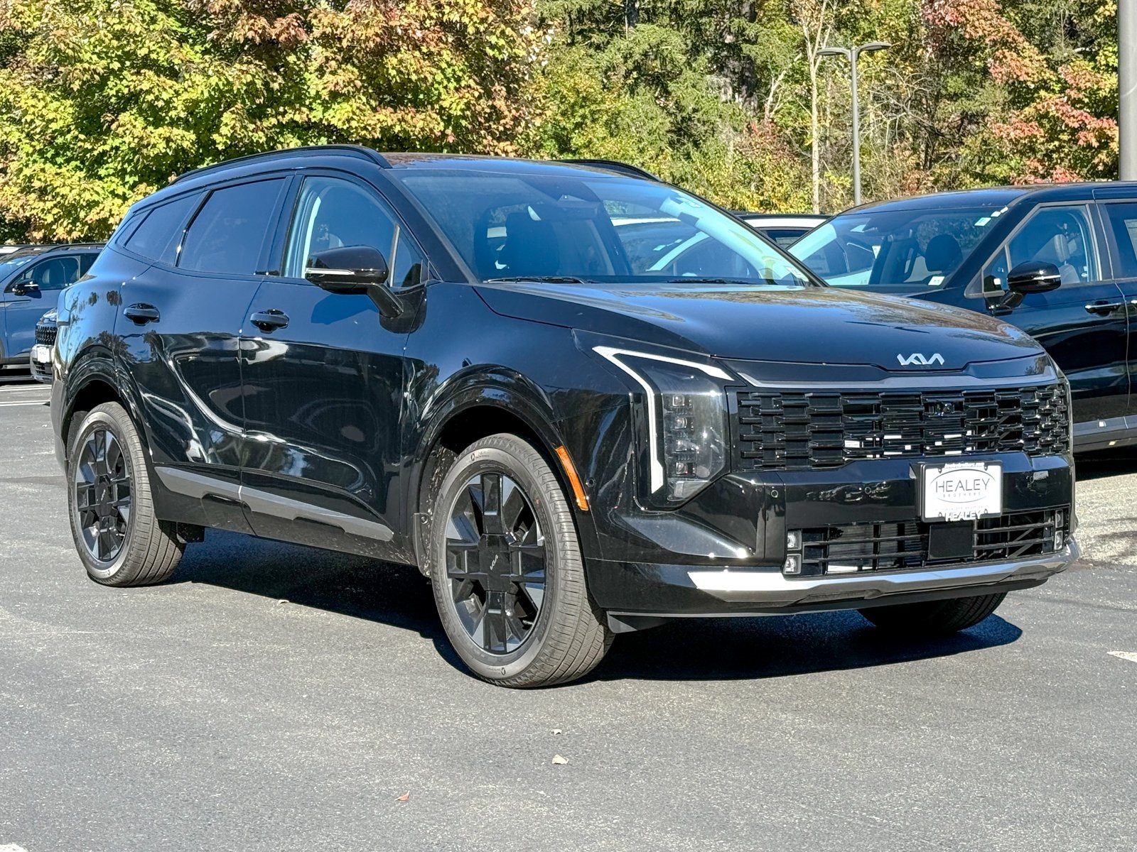 Photo view of 2026 Kia Sportage in Black