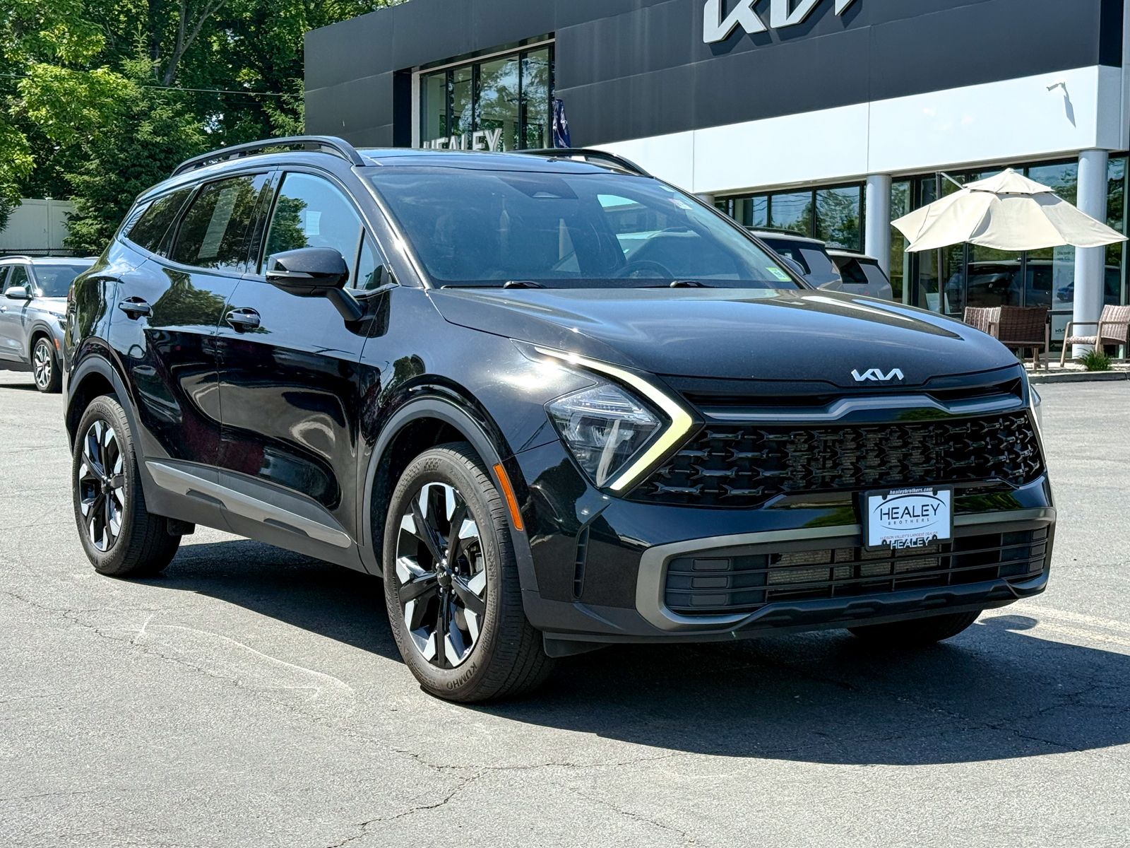 Photo view of 2023 Kia Sportage in Black