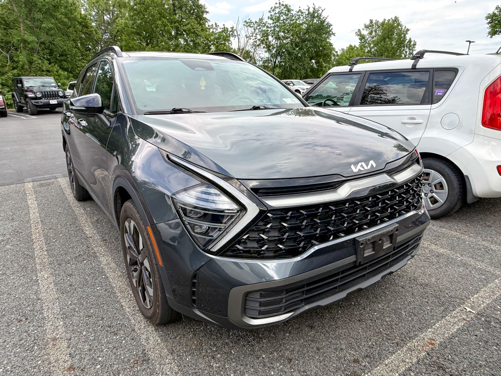 Photo view of 2024 Kia Sportage in Gray