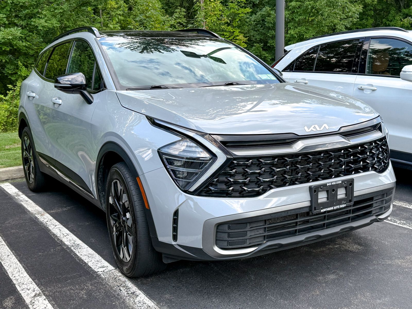 Photo view of 2024 Kia Sportage in Gray