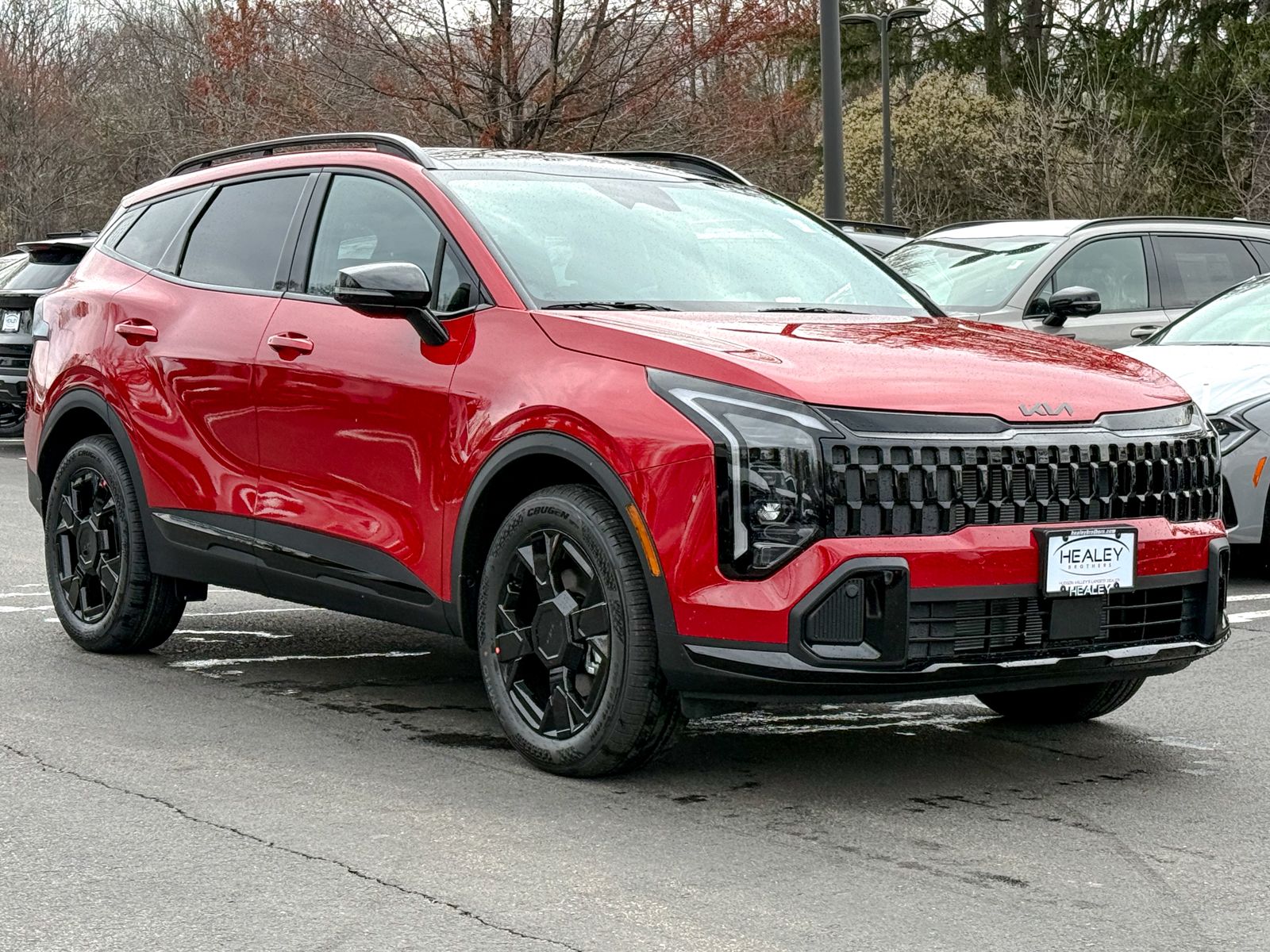 Photo view of 2026 Kia Sportage in Red
