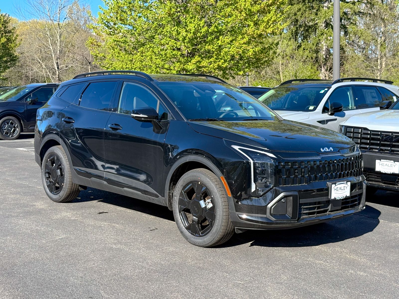 Photo view of 2026 Kia Sportage in Black