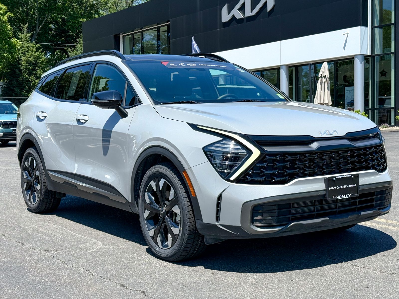 Photo view of 2024 Kia Sportage in Gray