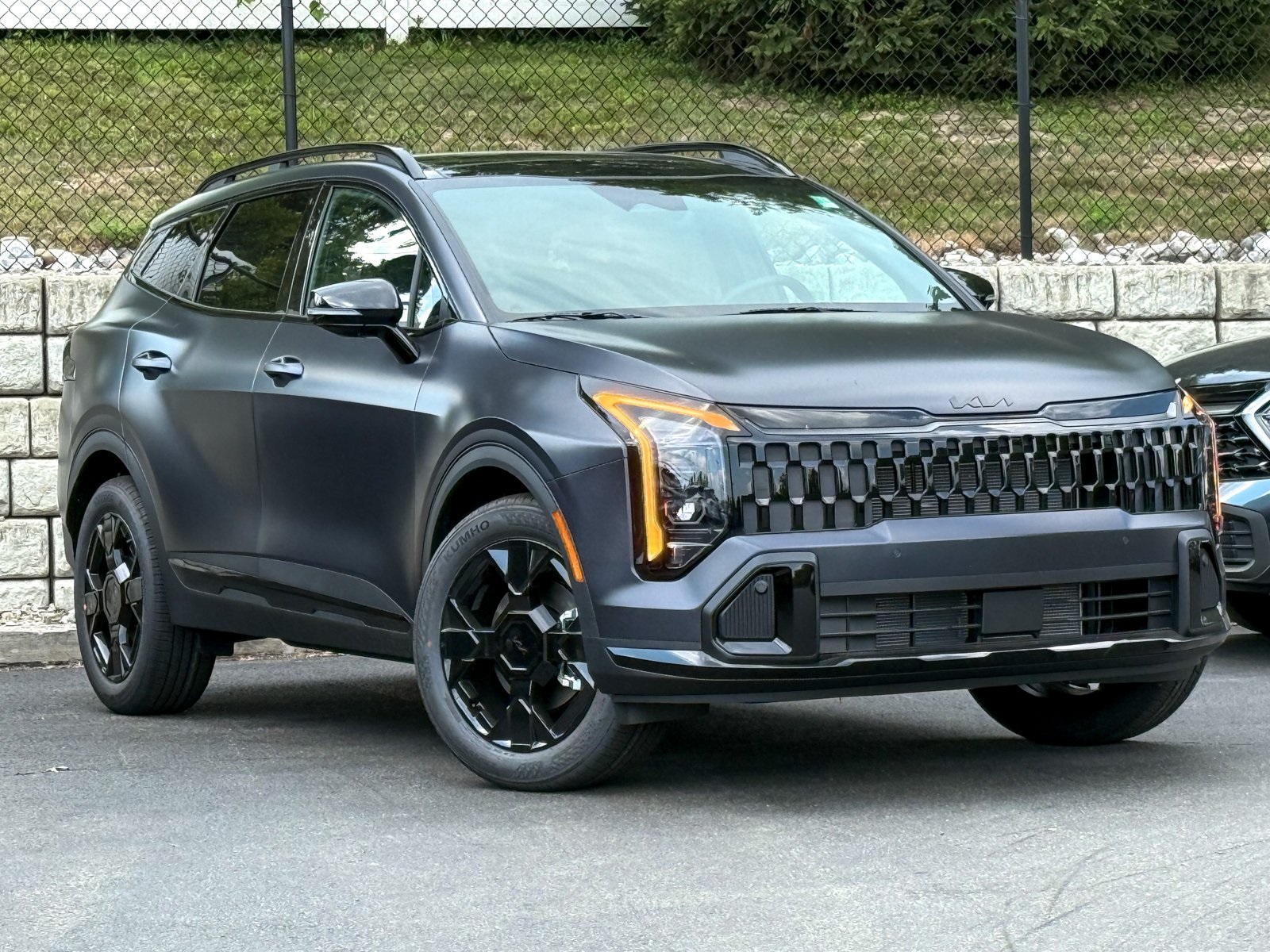 Photo view of 2026 Kia Sportage in Gray