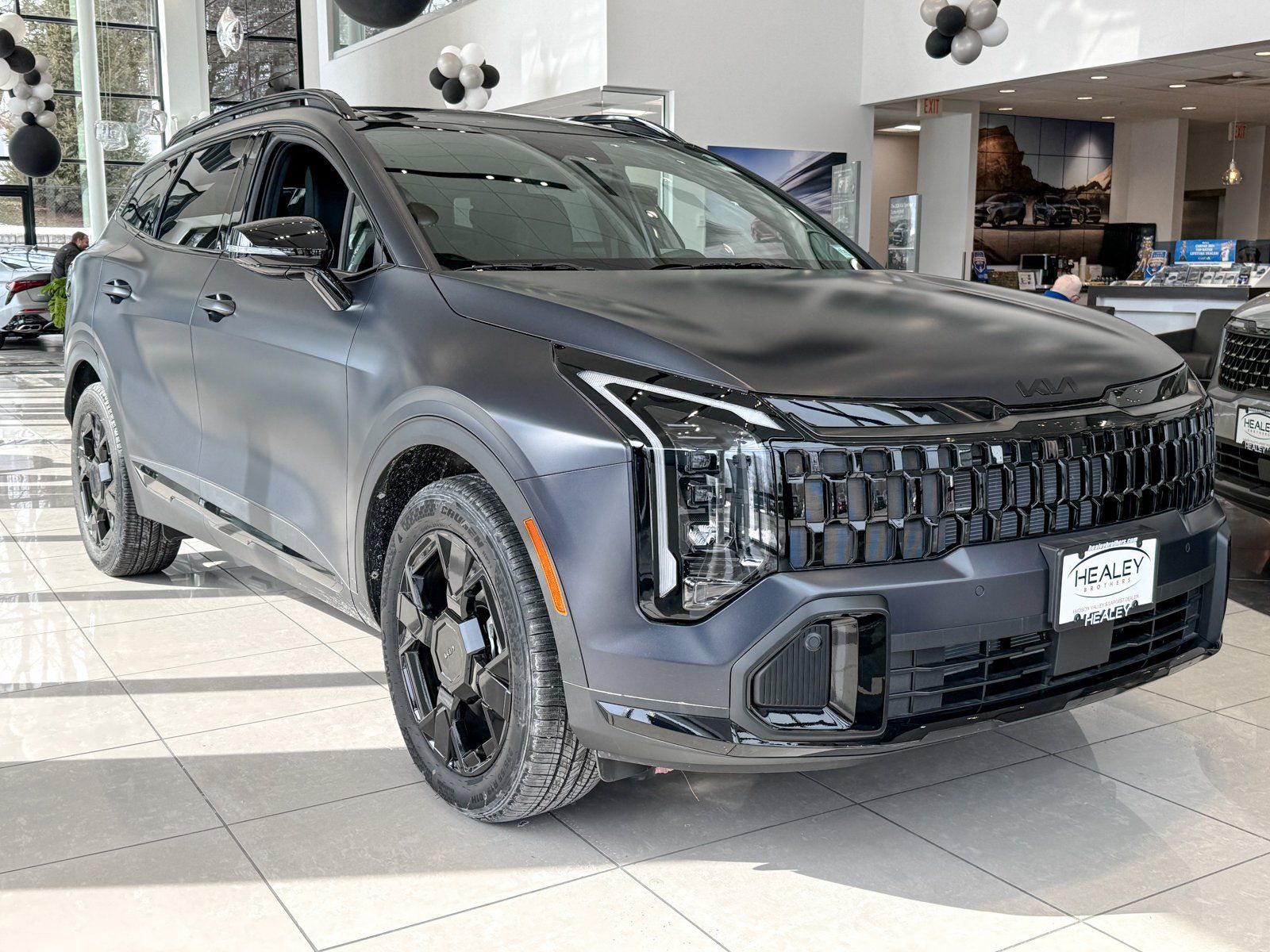 Photo view of 2026 Kia Sportage in Gray