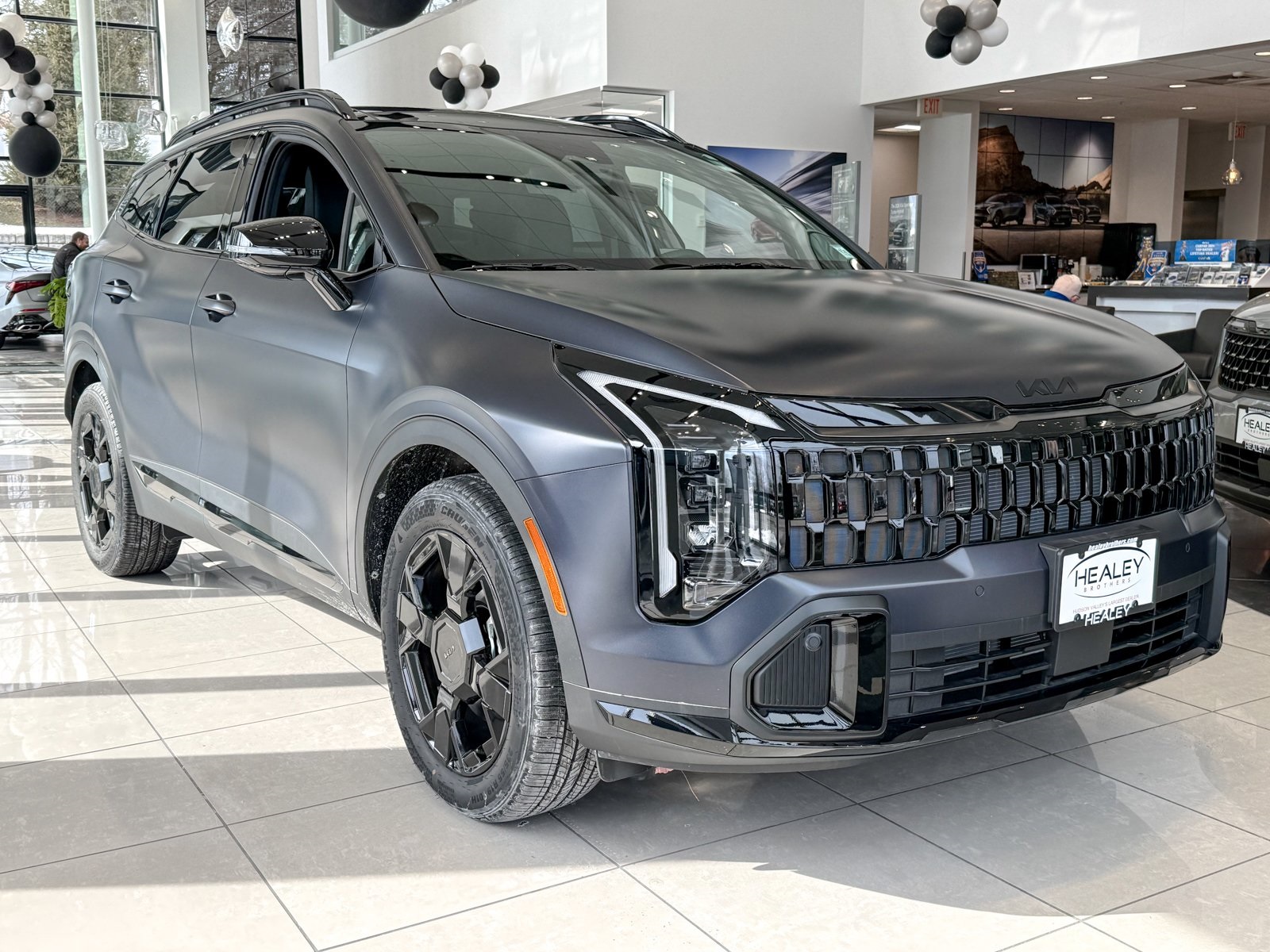 Photo view of 2026 Kia Sportage in Gray