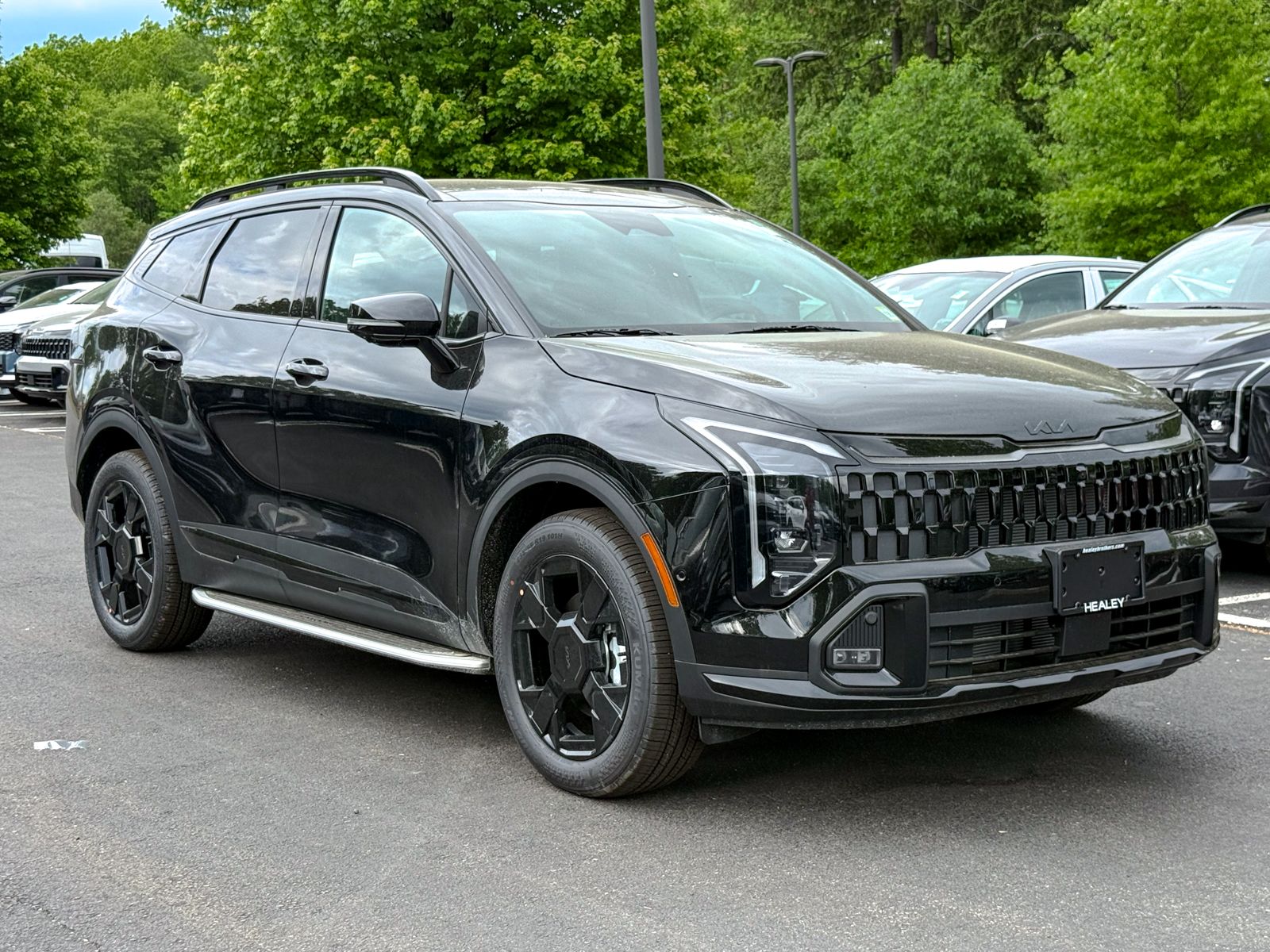 Photo view of 2026 Kia Sportage in Black