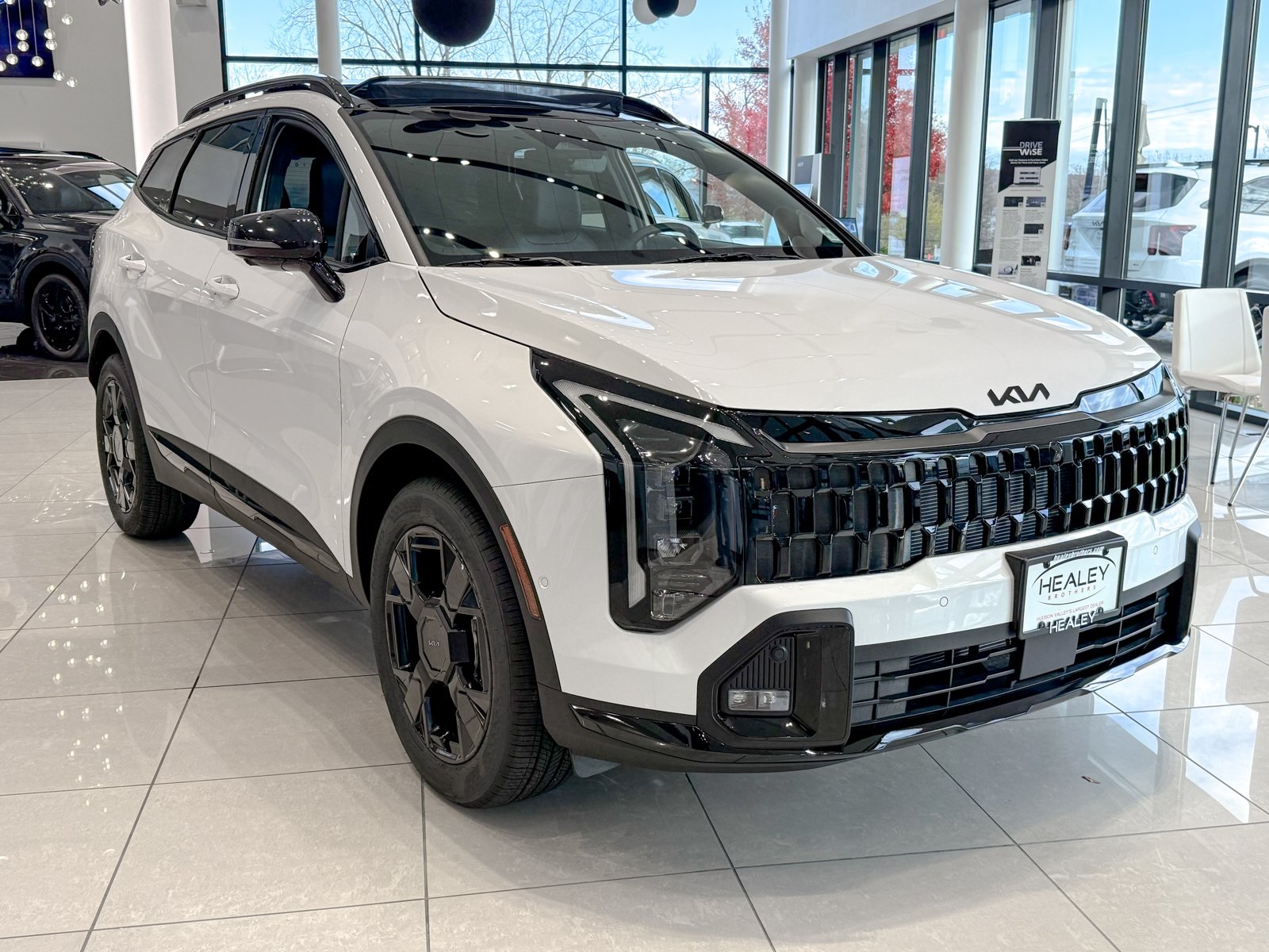 Photo view of 2026 Kia Sportage in White