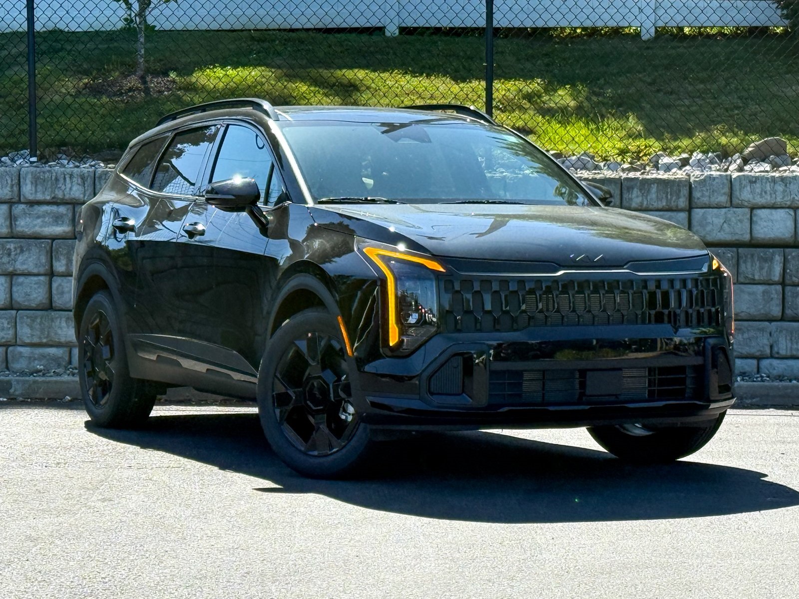 Photo view of 2026 Kia Sportage in Black