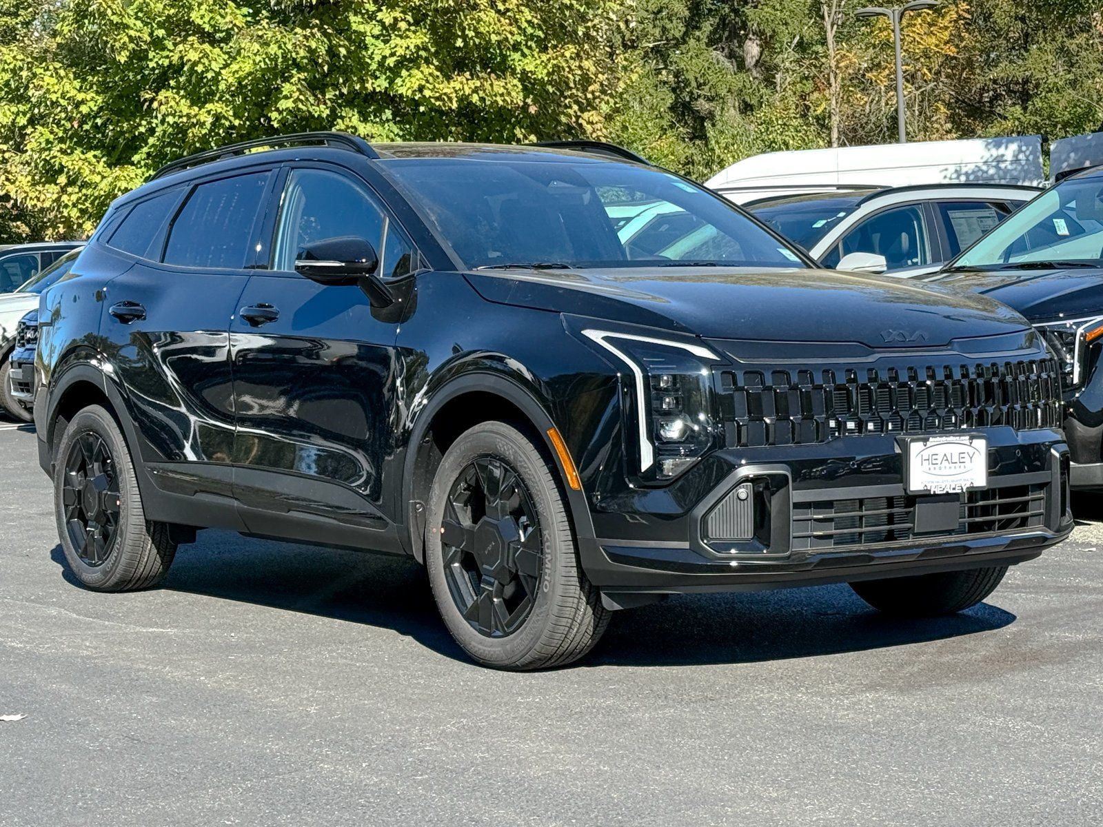 Photo view of 2026 Kia Sportage in Black