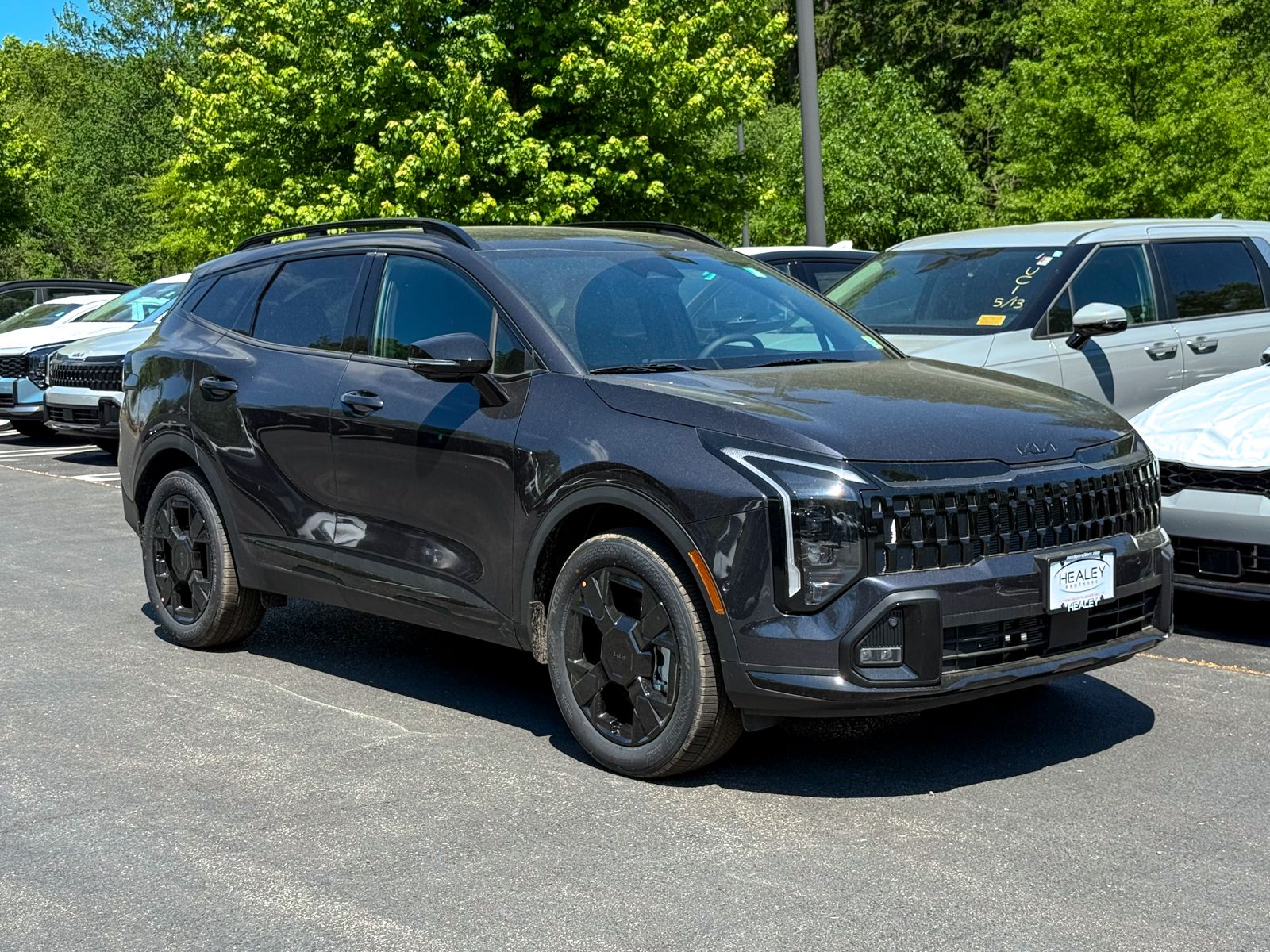 Photo view of 2026 Kia Sportage in Gray