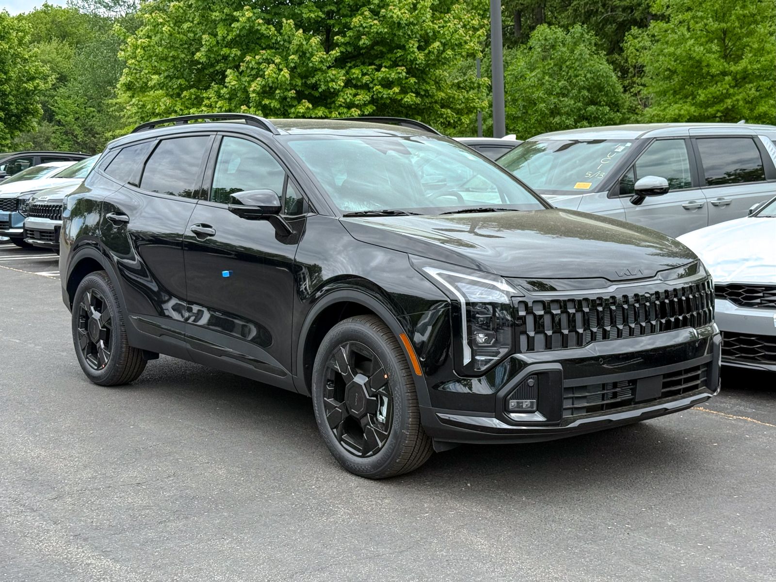 Photo view of 2026 Kia Sportage in Black