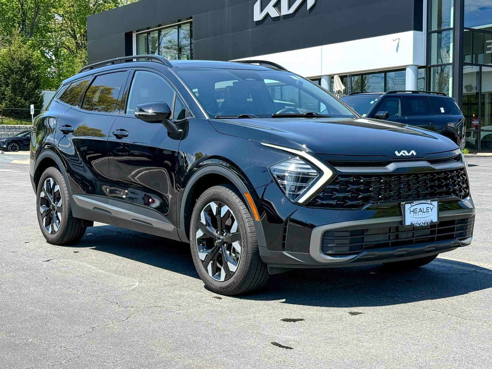 Photo view of 2024 Kia Sportage in Black