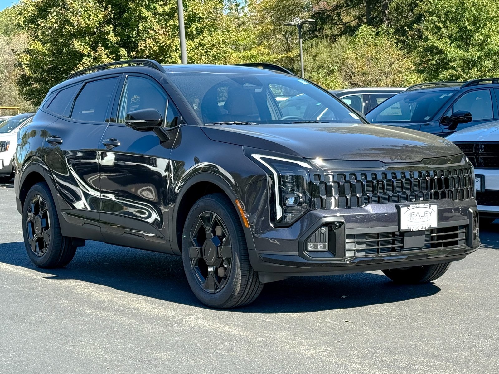 Photo view of 2026 Kia Sportage in Black