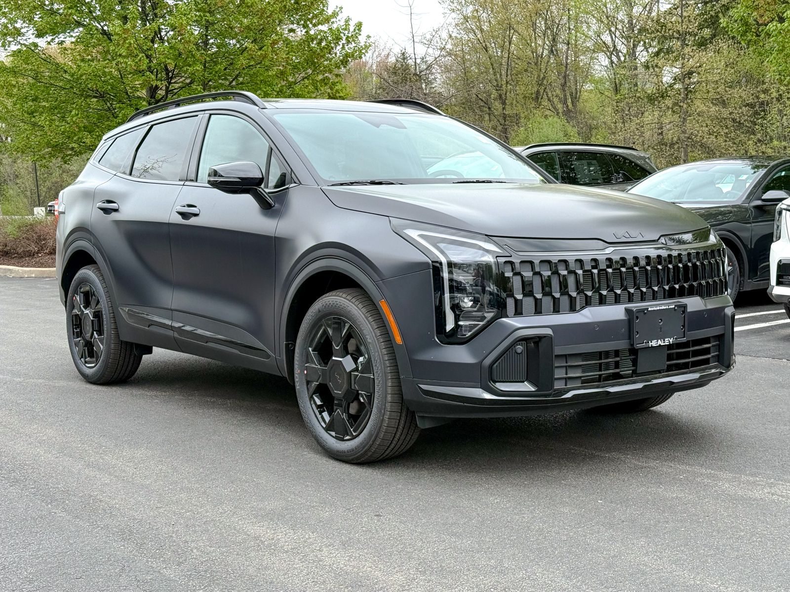 Photo view of 2026 Kia Sportage in Gray