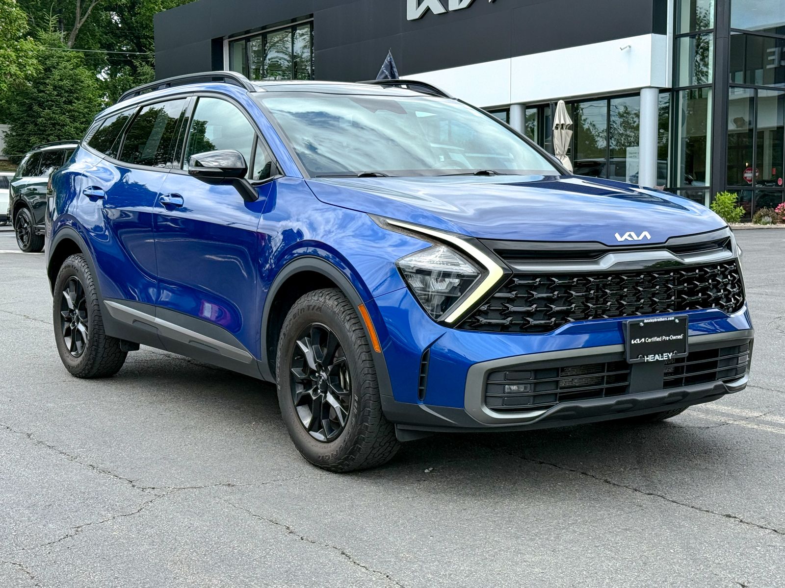 Photo view of 2023 Kia Sportage in Blue