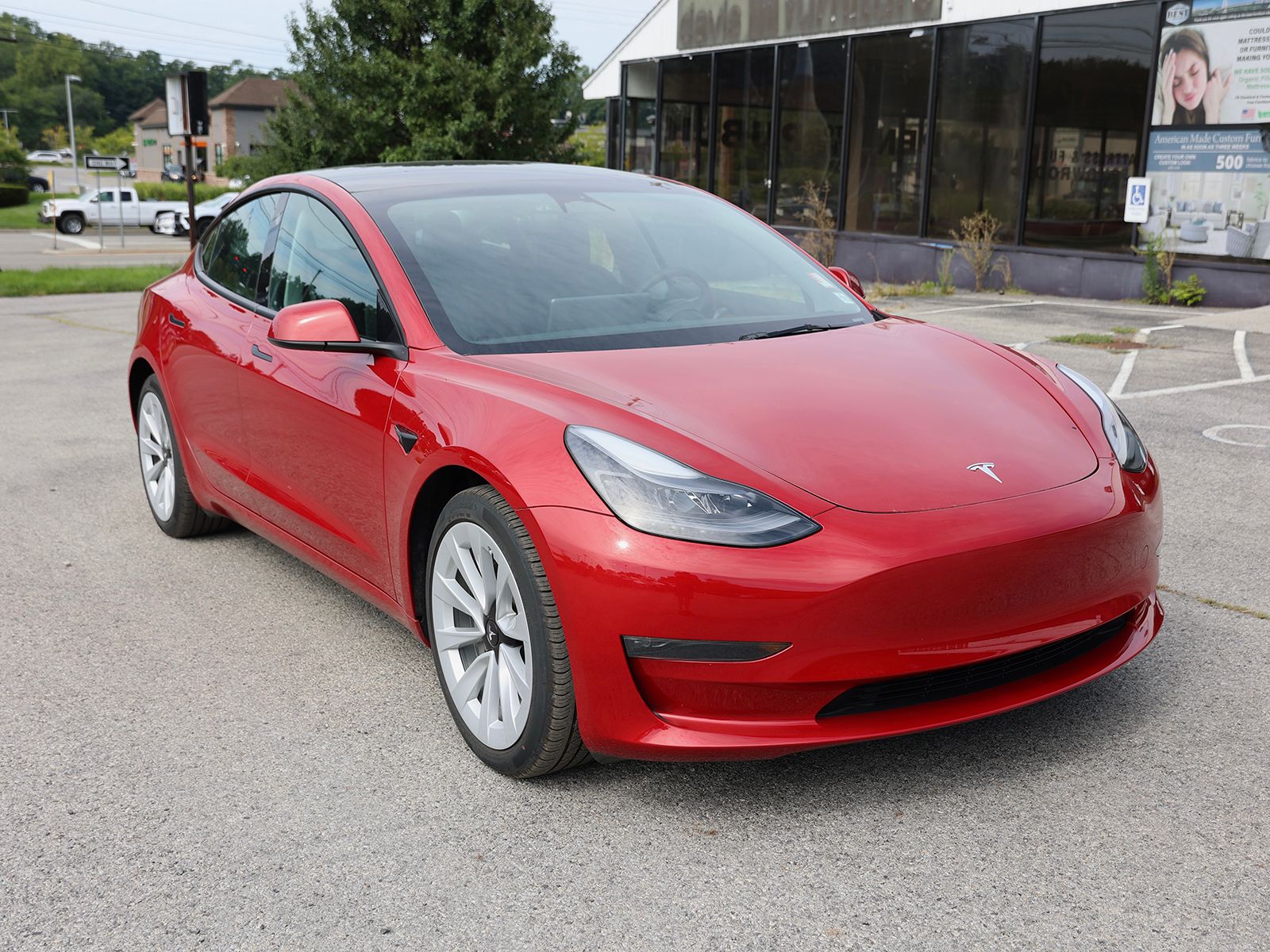 Photo view of 2023 Tesla Model 3 in Red