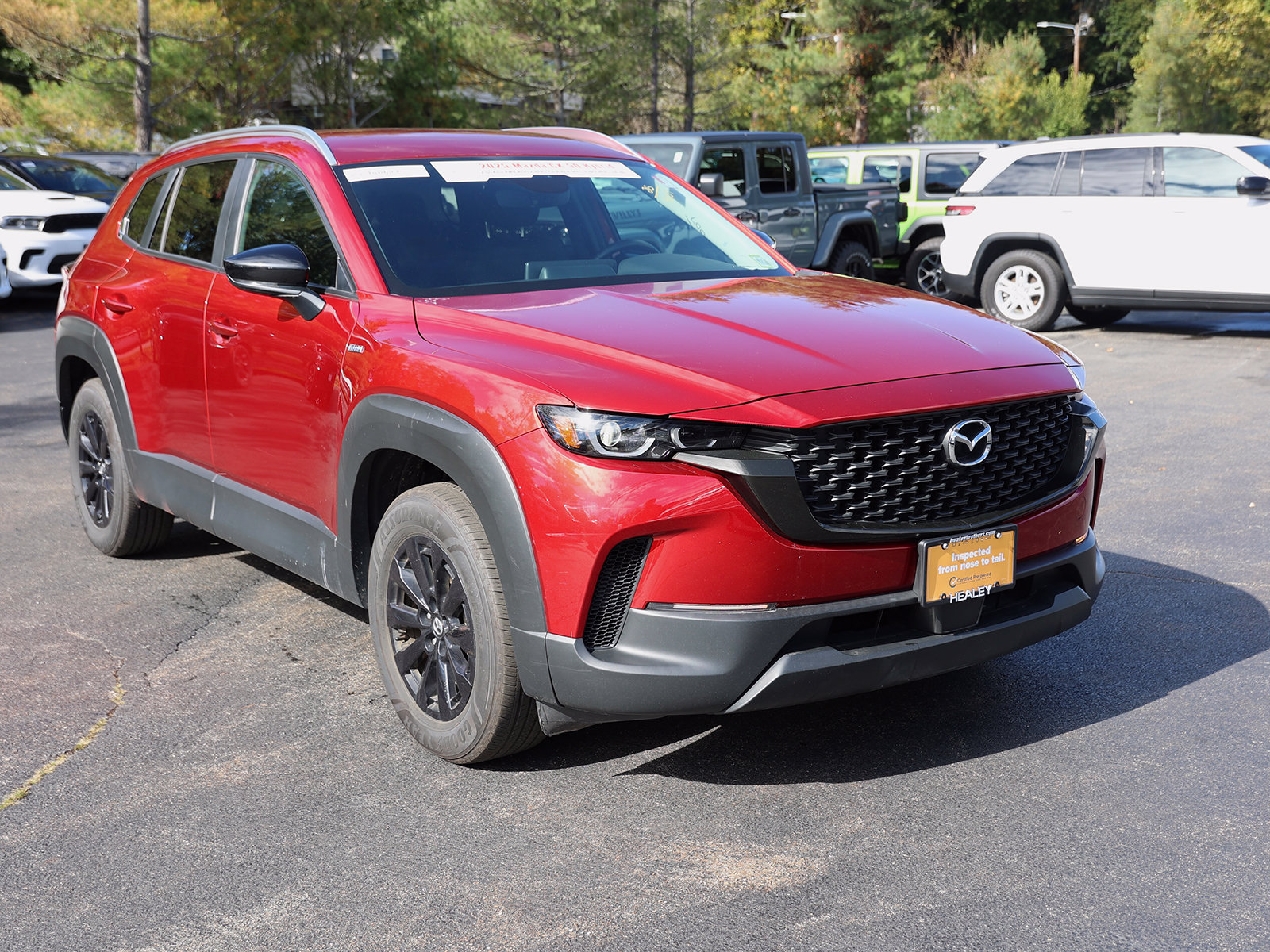 Photo view of 2025 Mazda CX-50 Hybrid in Red