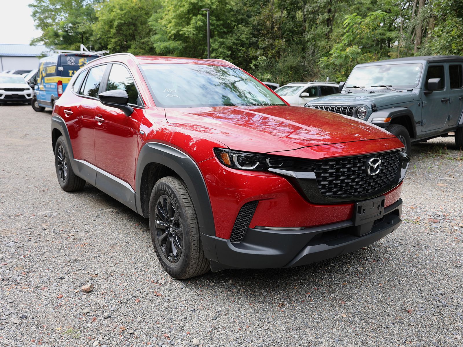 Photo view of 2025 Mazda CX-50 Hybrid in Red