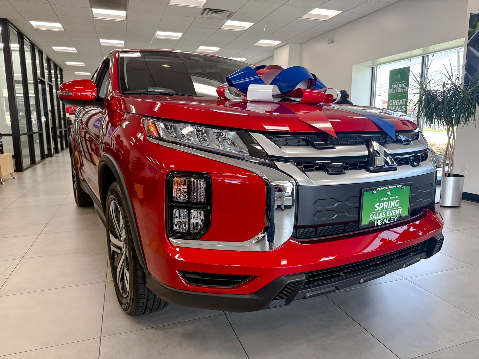 Photo view of 2026 Mitsubishi Outlander Sport in Red