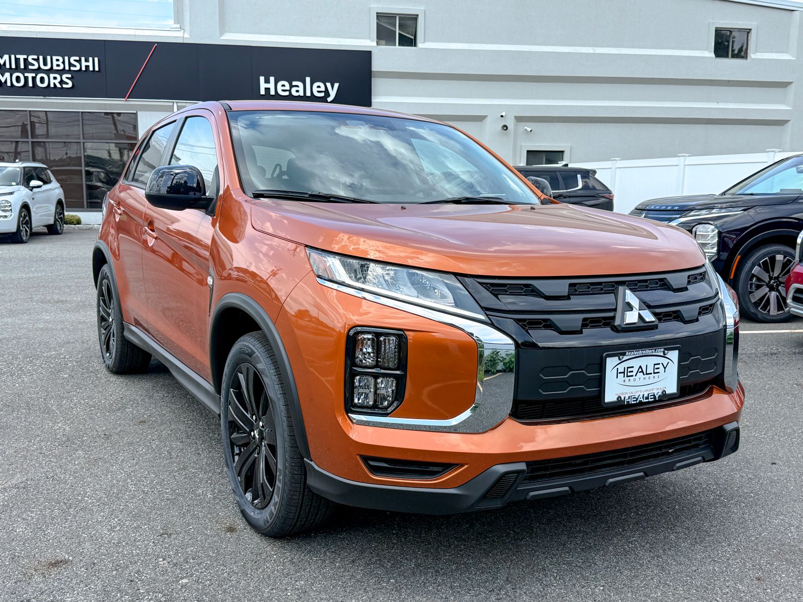 Photo view of 2026 Mitsubishi Outlander Sport in Orange