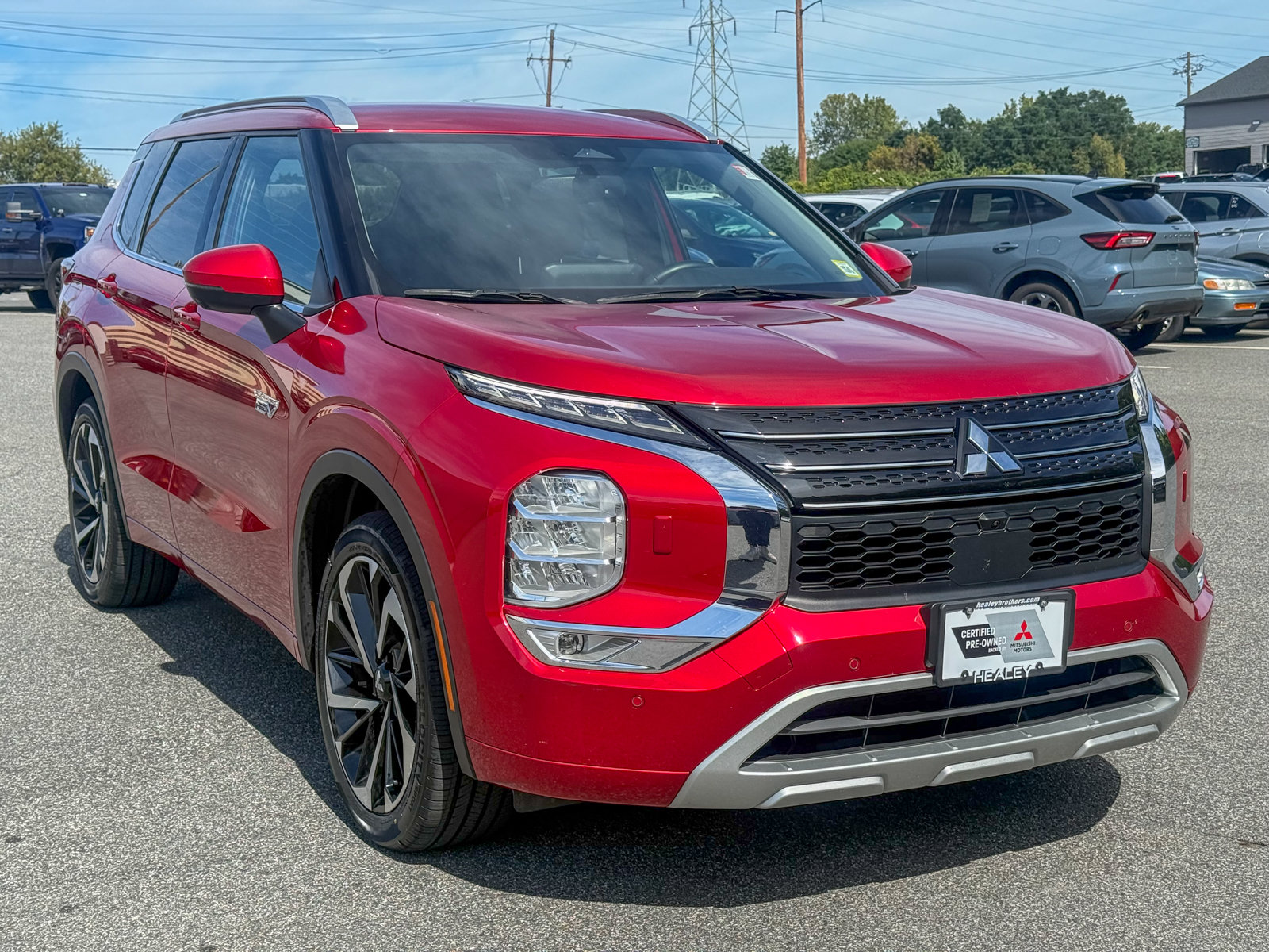 Photo view of 2023 Mitsubishi Outlander PHEV in Red
