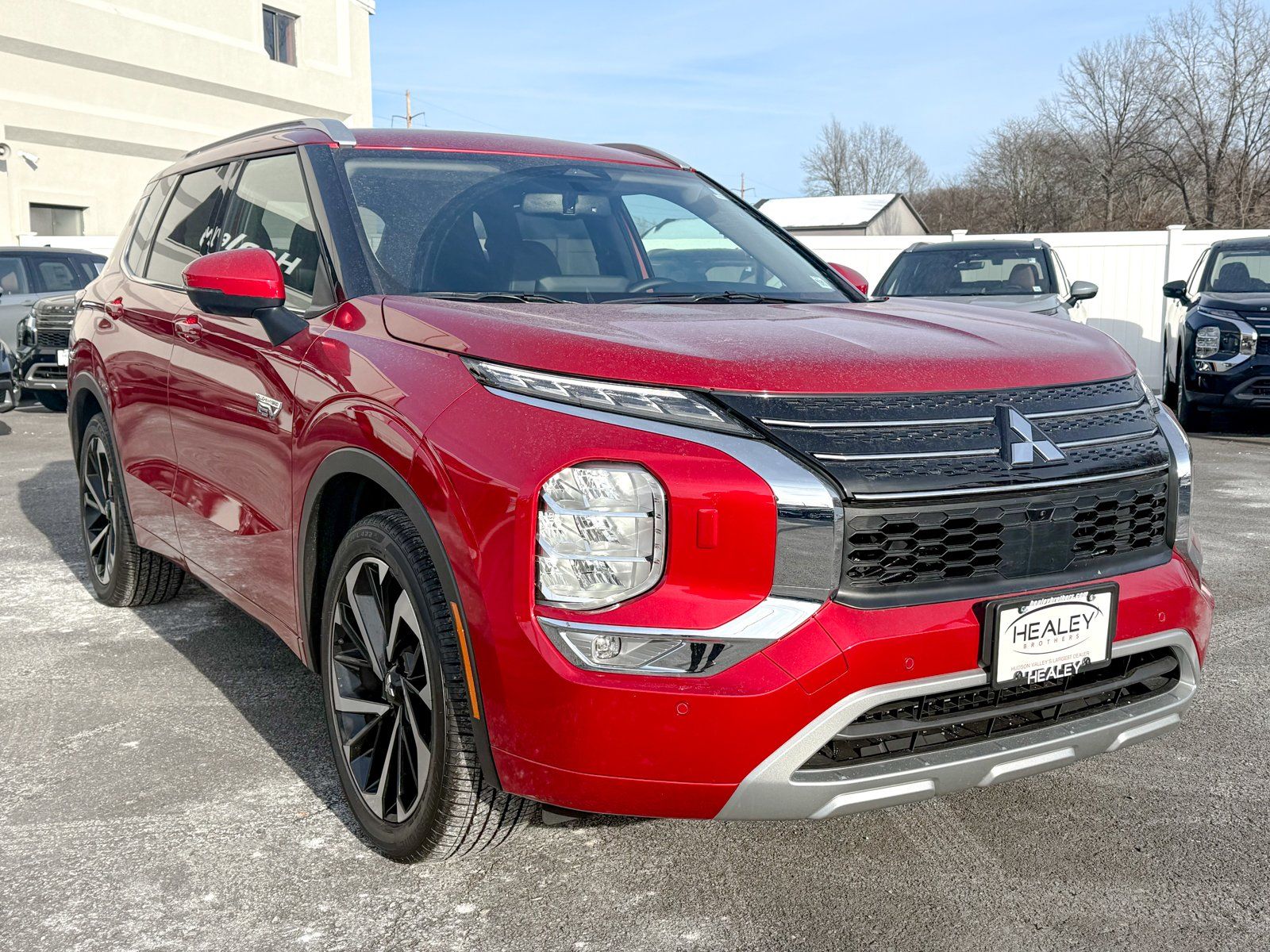 Photo view of 2025 Mitsubishi Outlander PHEV in Red