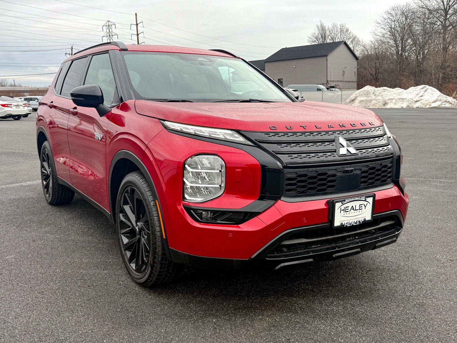 Photo view of 2025 Mitsubishi Outlander PHEV in Red
