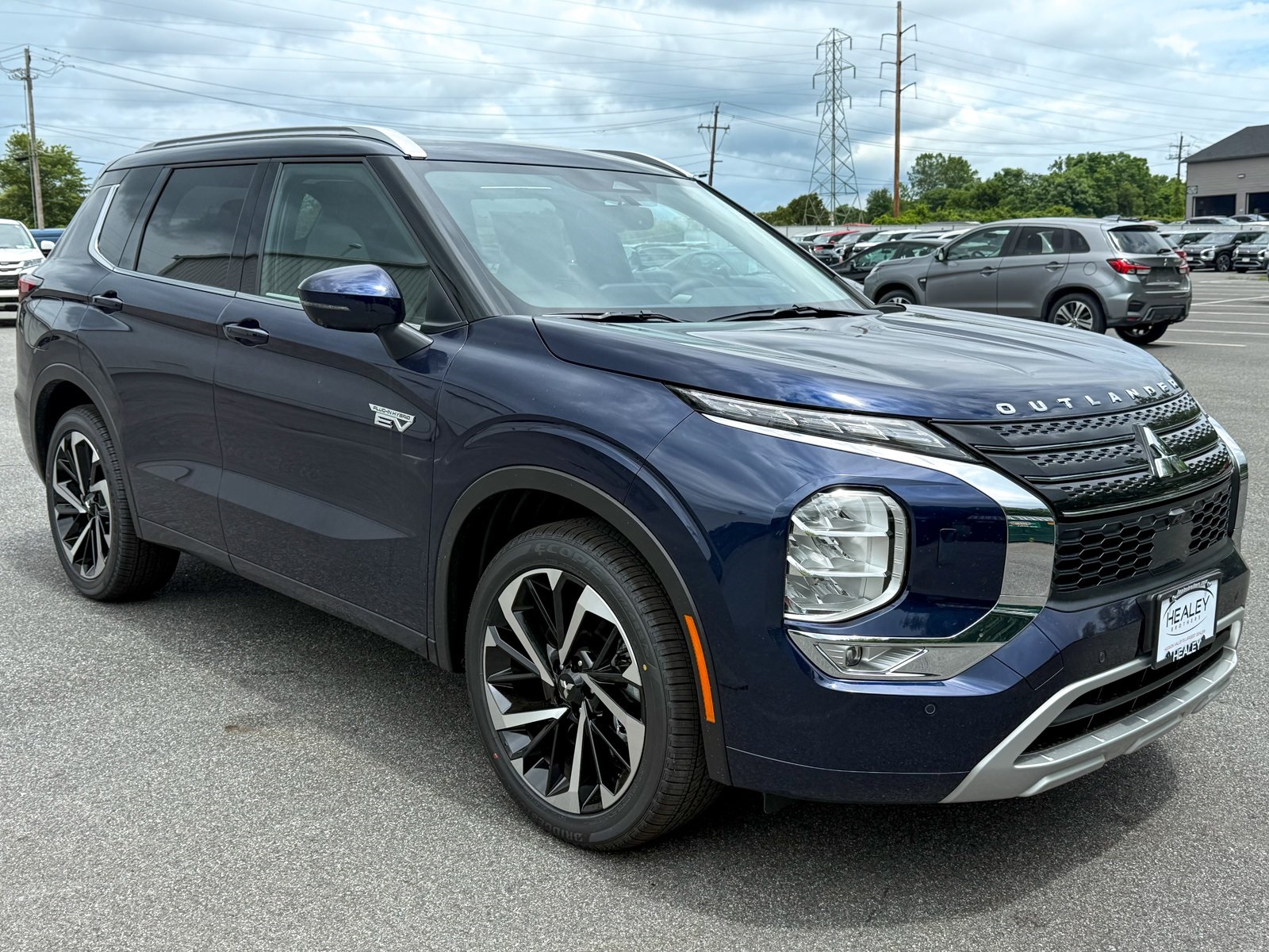 Photo view of 2025 Mitsubishi Outlander PHEV in Blue