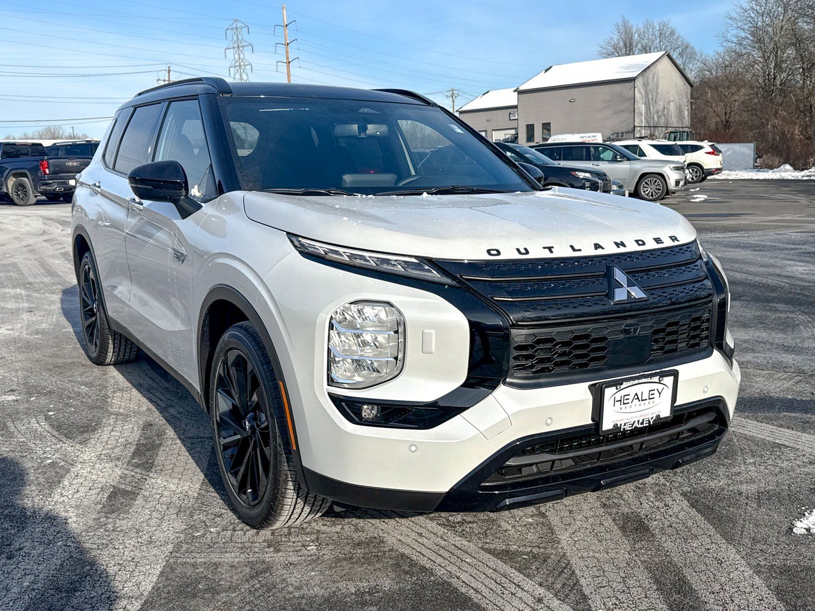 Photo view of 2025 Mitsubishi Outlander PHEV in White