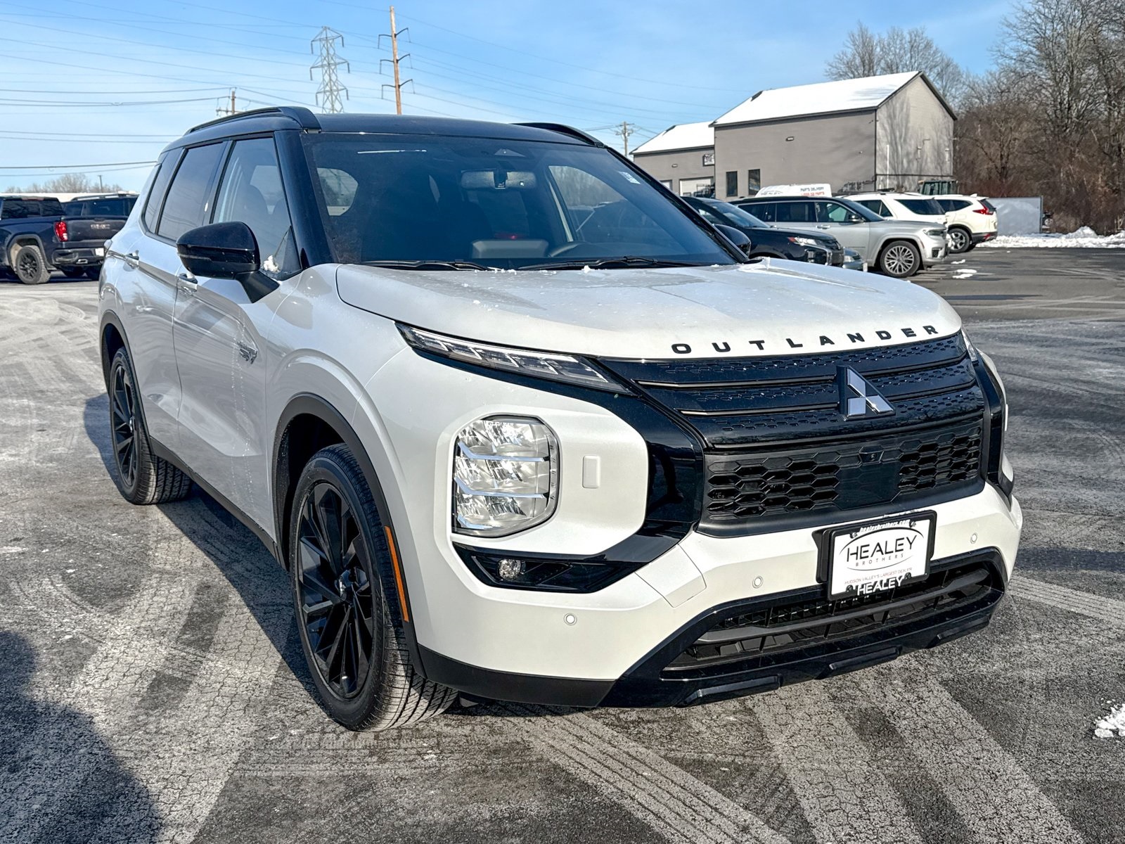 Photo view of 2025 Mitsubishi Outlander PHEV in White