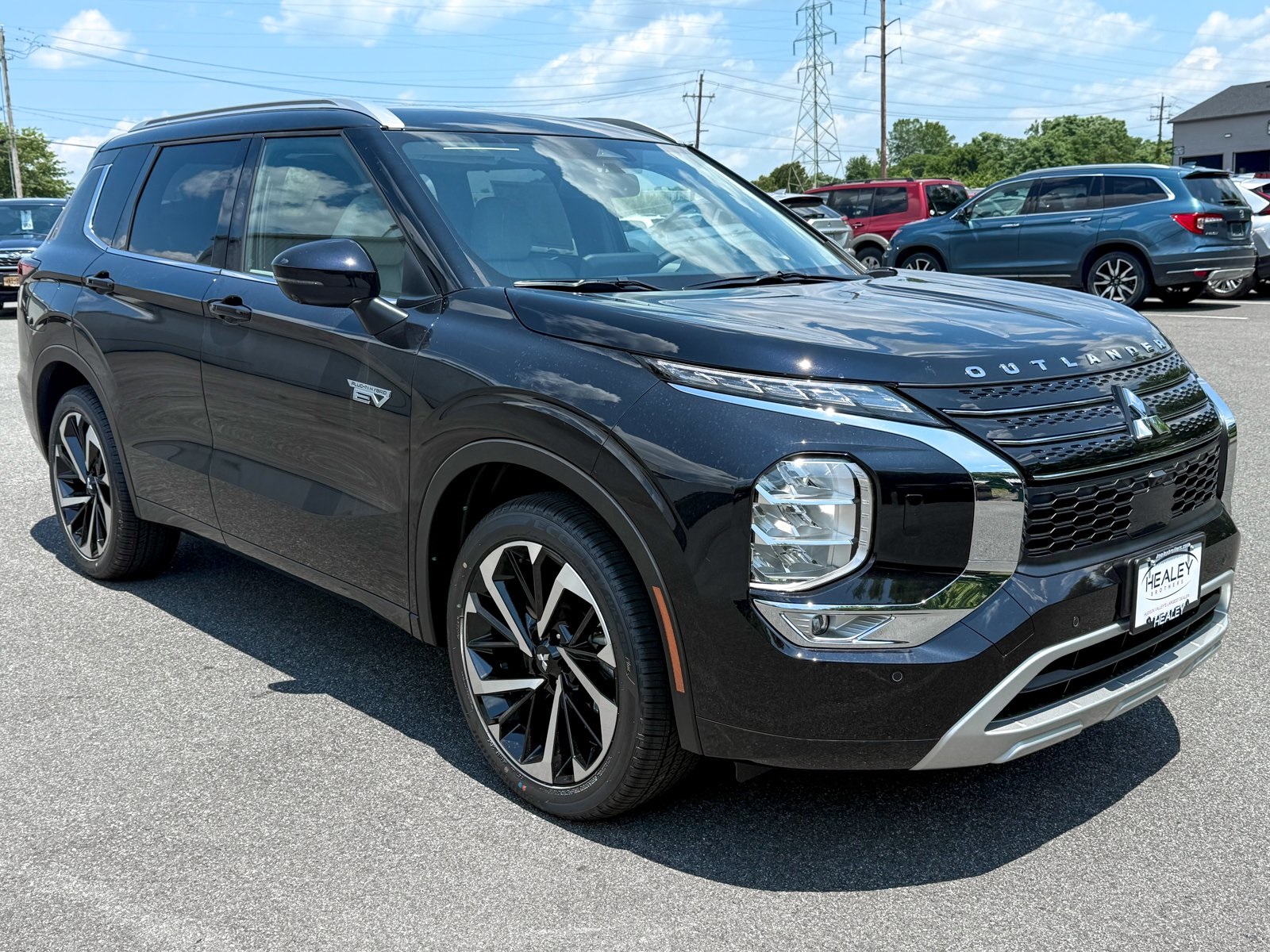 Photo view of 2025 Mitsubishi Outlander PHEV in Black