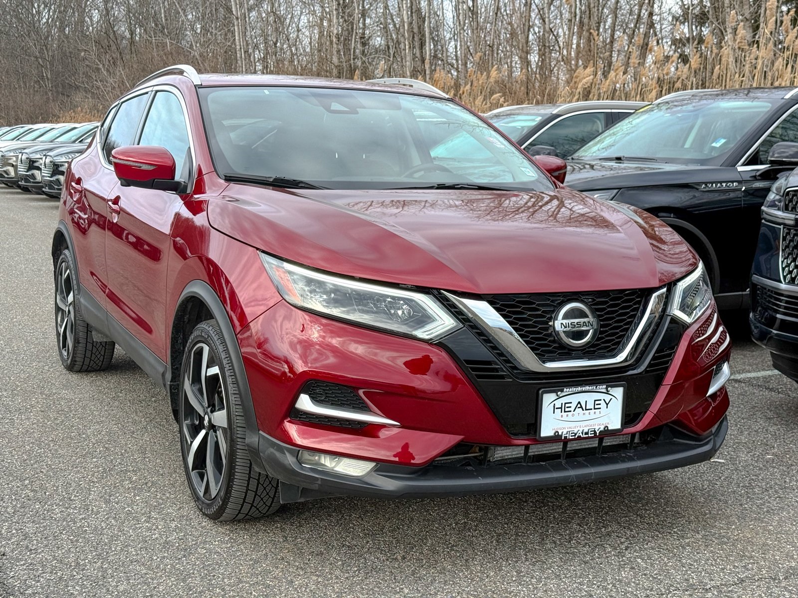 Photo view of 2020 Nissan Rogue Sport in Red