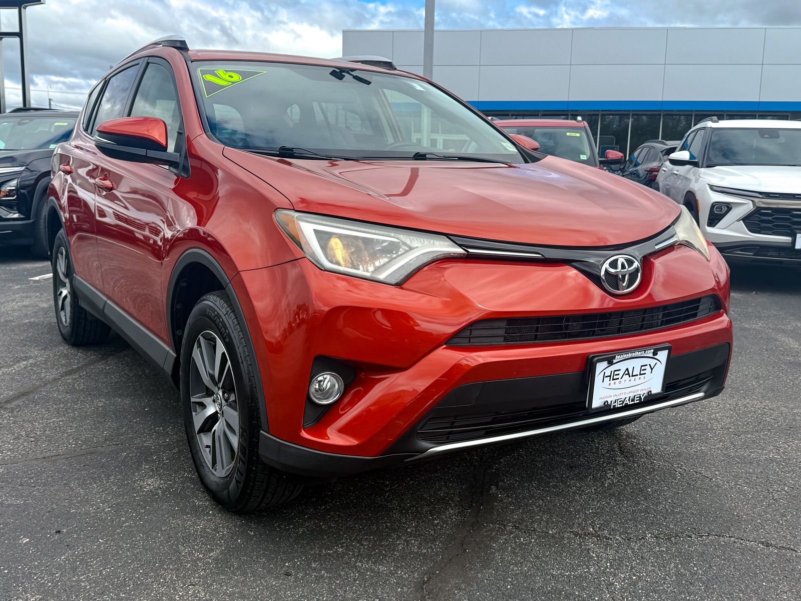 Photo view of 2016 Toyota RAV4 in Orange