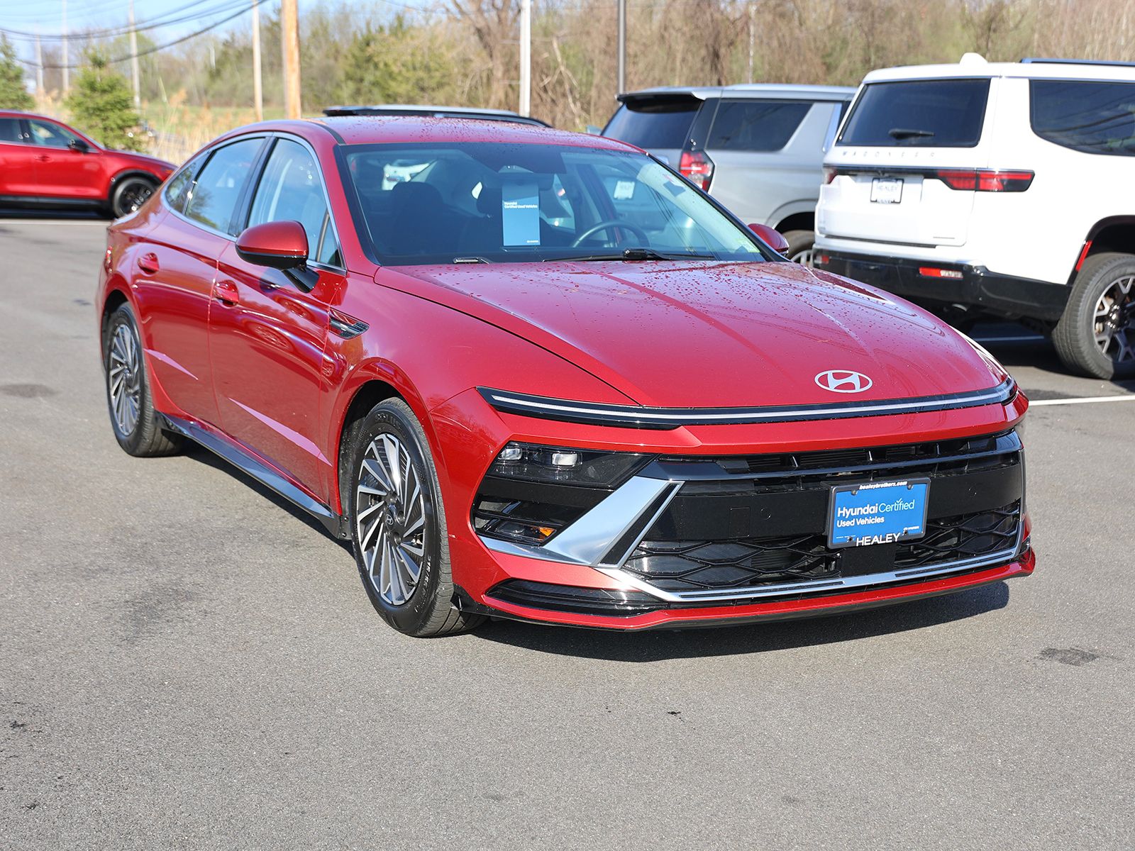 Photo view of 2024 Hyundai Sonata Hybrid in Red