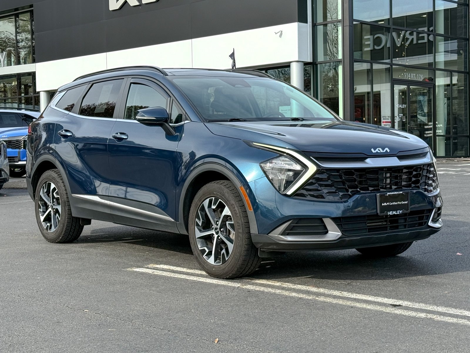 Photo view of 2023 Kia Sportage Hybrid in Blue