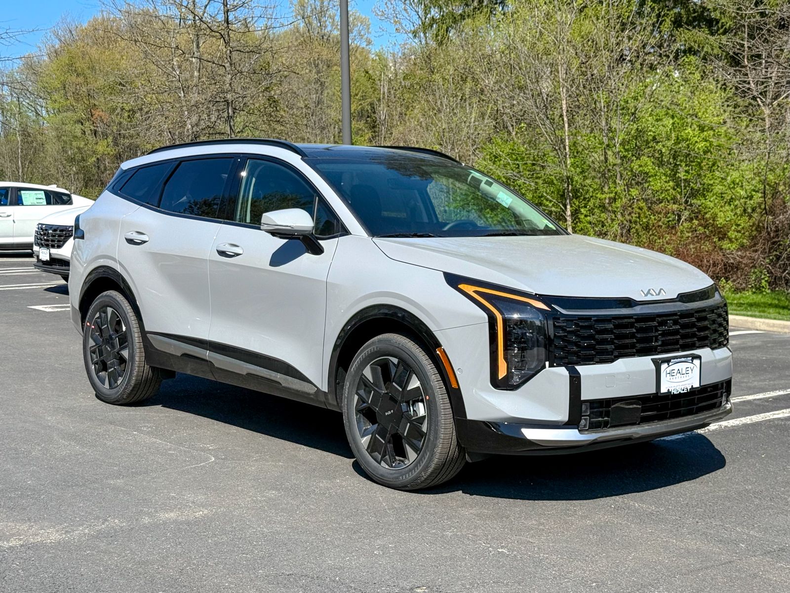 Photo view of 2026 Kia Sportage Hybrid in Gray