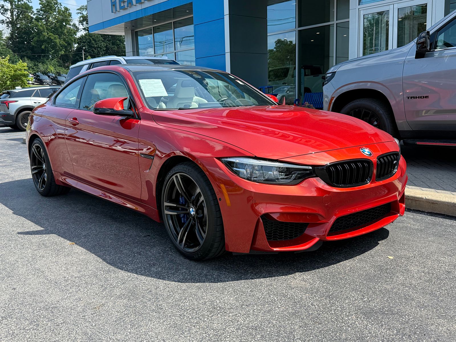 Photo view of 2019 BMW M4 in Orange