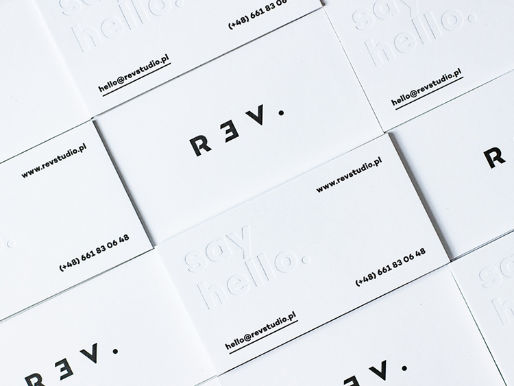 Simple, embossed business card design by Michal Kubalcyzk