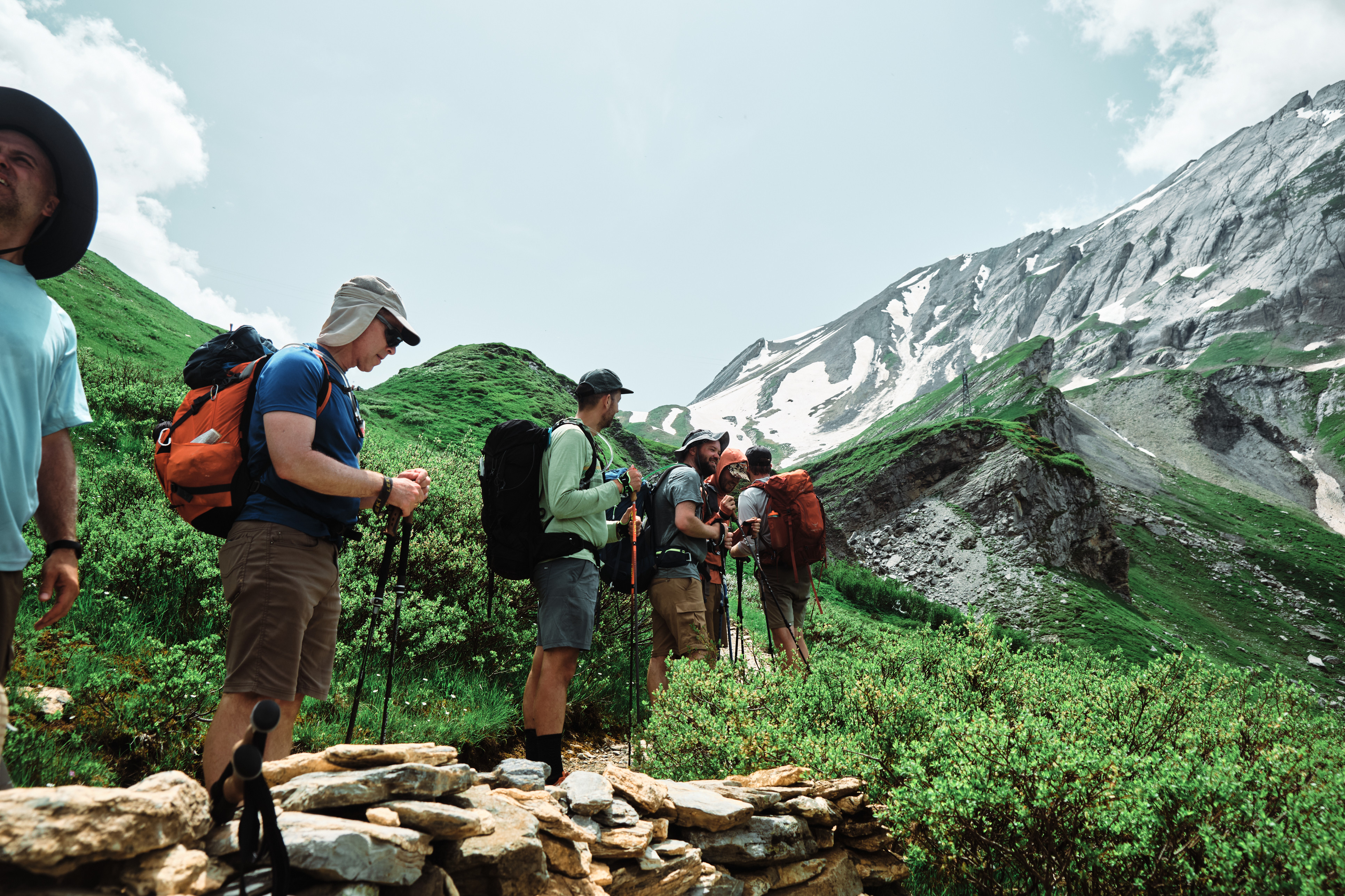 A group of men hiking on a mountain