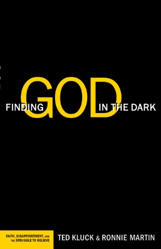 Book cover with black background and title text with word "God" large