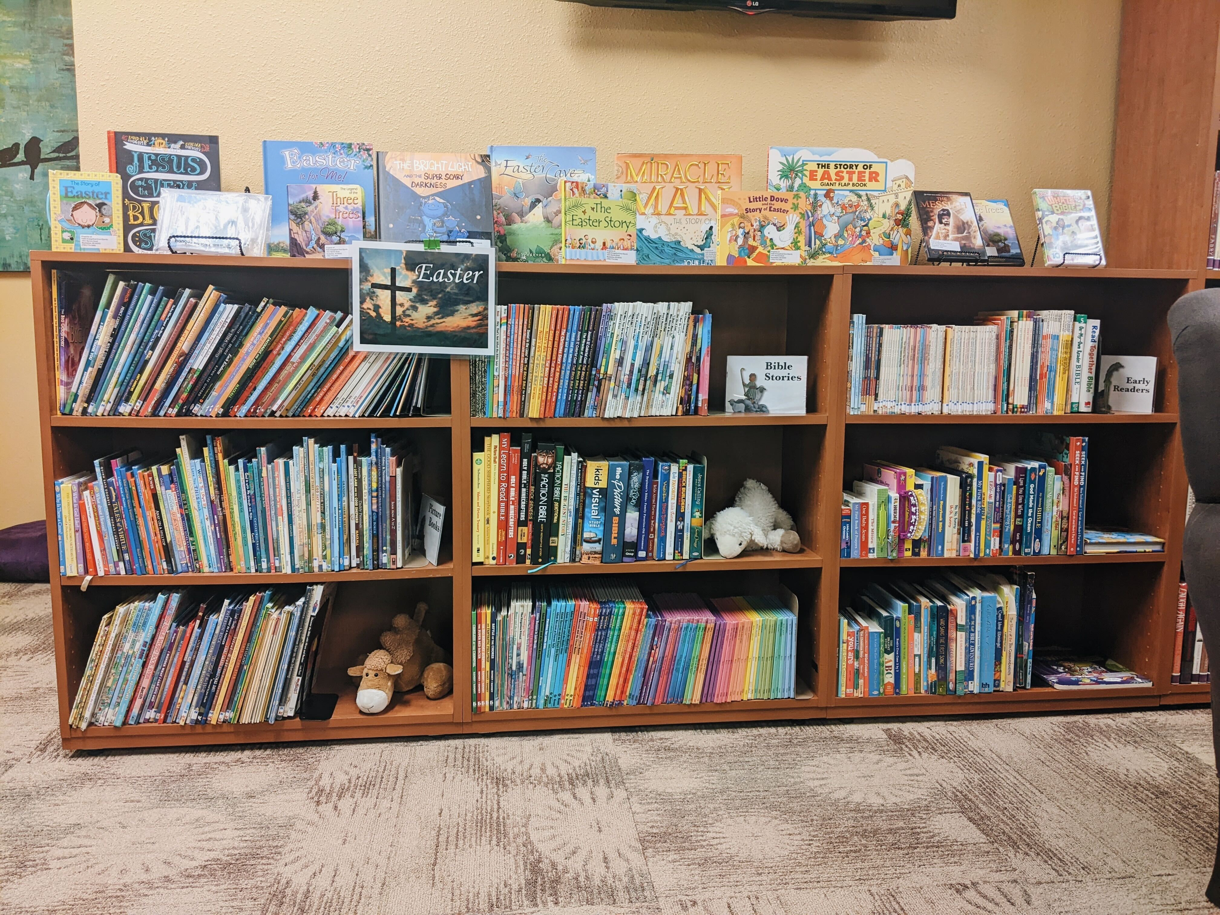 A small bookshelf filled with children's books.