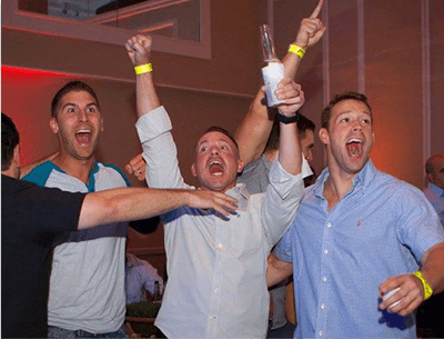 Guys celebrating