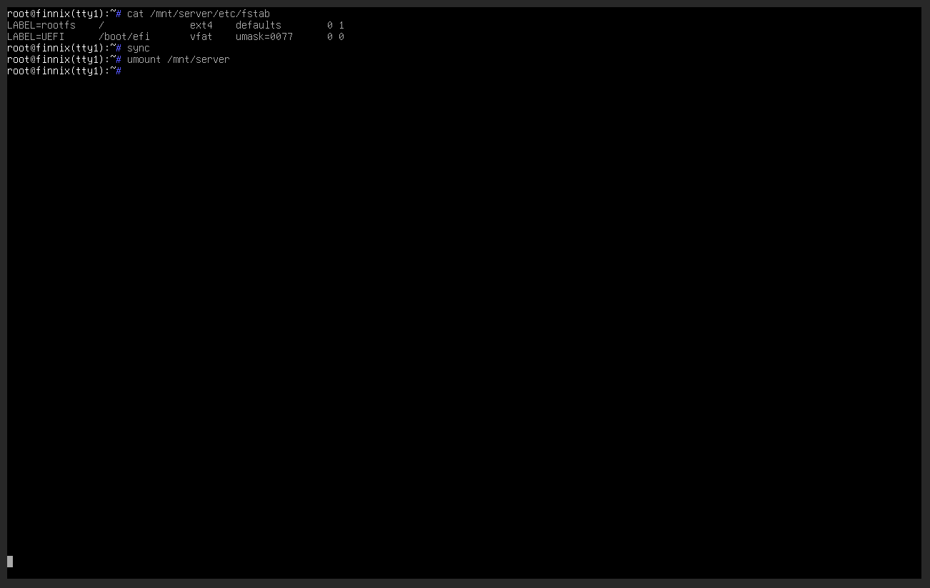 Finnix showing the corrected fstab file followed by a successful unmount