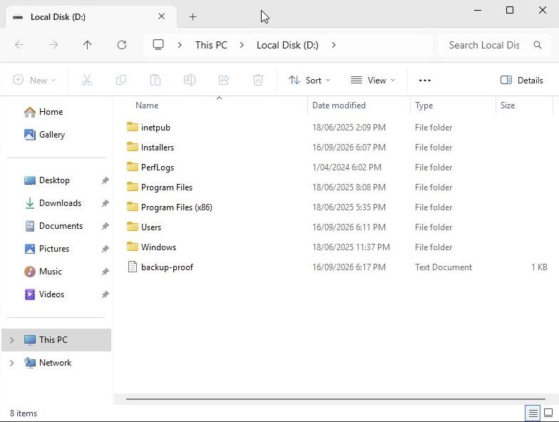 The attached Windows backup opened as drive D in File Explorer, showing its folders and a test file